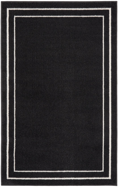 Nourison Home Nourison Essentials NRE02 Black Ivory Contemporary Power-loomed Rug