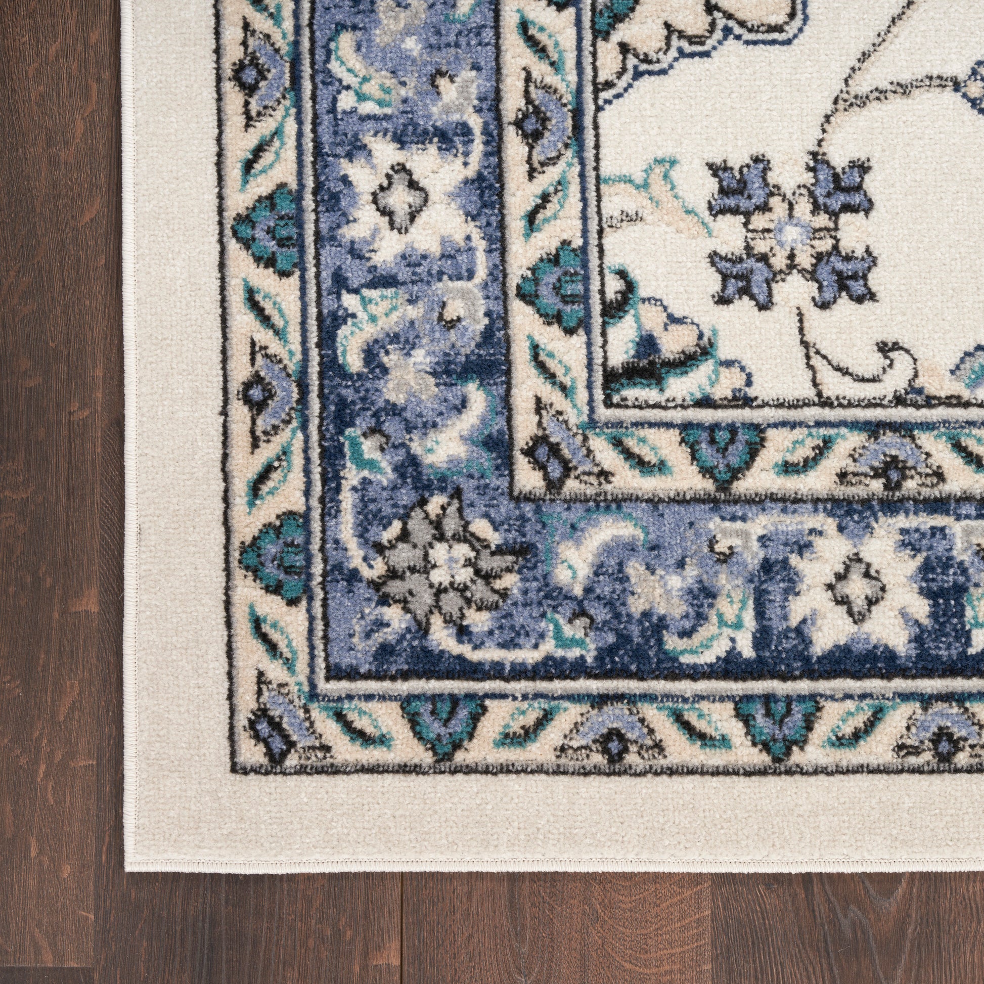 Nourison Home Nourison Essentials  Ivory Blue  Traditional